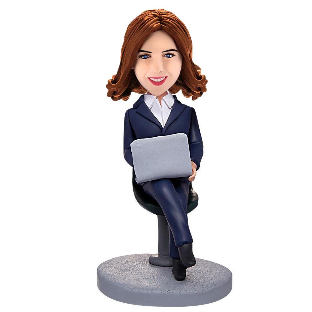 http://www.mydedor.com/cdn/shop/products/Female-Boss-Working-With-Laptopt-Custom-Engraved-Text-Bobbleheads.jpg?v=1663292956