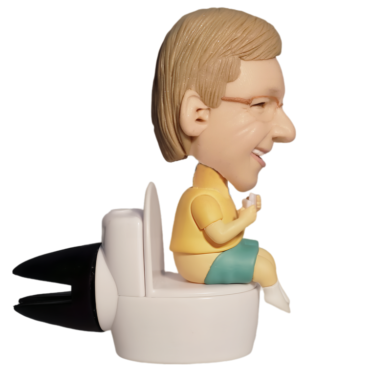 HOMME ASSIS SUR LA BOBBLEHEAD DES TOILETTES